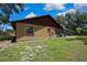 Well-maintained backyard with a screened-in patio, perfect for outdoor living and entertaining at 4706 Scott Rd, Lutz, FL 33558