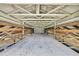 View of the barn's interior, showcasing its sturdy wooden beams and bright metal roof at 4706 Scott Rd, Lutz, FL 33558