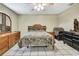 Bedroom with dresser, open closet and ceiling fan at 4706 Scott Rd, Lutz, FL 33558