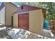 Close up of exterior view of a versatile outbuilding offering ample space for storage on the property at 4706 Scott Rd, Lutz, FL 33558