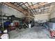 Spacious outbuilding interior with ample storage, workshop space, and tools at 4706 Scott Rd, Lutz, FL 33558