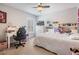 Serene bedroom providing a dedicated workspace and comfortable sleeping area at 5049 Rushbrook Rd, Land O Lakes, FL 34638