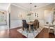 Traditional dining room featuring a wooden table and upholstered chairs at 5049 Rushbrook Rd, Land O Lakes, FL 34638