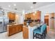 Spacious kitchen features granite countertops, stainless steel appliances, and a breakfast bar at 5049 Rushbrook Rd, Land O Lakes, FL 34638