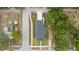 Aerial view of a home featuring backyard, new roof, and tree lined street at 5055 2Nd S Ave, St Petersburg, FL 33707