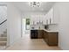 Elegant bar area with modern cabinetry, wine fridge, and stylish design, ideal for entertaining at 5055 2Nd S Ave, St Petersburg, FL 33707