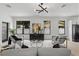 Stylish living room showcasing modern furniture, contemporary lighting, and neutral tones for a cozy feel at 5055 2Nd S Ave, St Petersburg, FL 33707