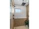 Modern shower features rain shower head, body sprayers, decorative tile, and glass enclosure at 5055 2Nd S Ave, St Petersburg, FL 33707