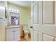 Bright bathroom featuring a vanity, mirror, lighting, toilet, and tub/shower combo at 5915 Brickleberry Ln # 103, Zephyrhills, FL 33541