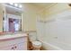 Hall bathroom features a vanity and tub/shower combination at 5915 Brickleberry Ln # 103, Zephyrhills, FL 33541
