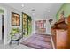 Hallway with painted bookshelf and a view into other rooms at 614 Norton St, Longboat Key, FL 34228