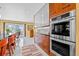 Bright kitchen features modern stainless steel appliances and ample cabinet space at 614 Norton St, Longboat Key, FL 34228