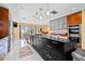 Bright, spacious kitchen with a large center island and stainless steel appliances at 614 Norton St, Longboat Key, FL 34228