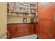 Walk-in pantry with custom cabinets and ample storage shelves at 614 Norton St, Longboat Key, FL 34228
