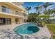 Private backyard pool with covered seating, perfect for outdoor relaxation and entertainment at 614 Norton St, Longboat Key, FL 34228