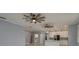 Open-concept living area seamlessly connects to a modern kitchen, promoting easy living at 632 S Florida Ave, Tarpon Springs, FL 34689
