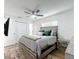 Bedroom featuring a neutral color palette with ceiling fan, and closet at 6521 Cedarbrook S Dr, Pinellas Park, FL 33782
