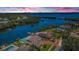 Aerial view of waterfront homes with canal access and private pools at 671 Tallahassee Ne Dr, St Petersburg, FL 33702
