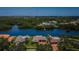 Waterfront homes with pools and private docks line a scenic canal at 671 Tallahassee Ne Dr, St Petersburg, FL 33702