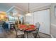 Cozy dining area adjacent to the kitchen, featuring a round table, perfect for casual meals at 671 Tallahassee Ne Dr, St Petersburg, FL 33702