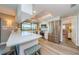 Bright kitchen with white cabinets, stainless steel appliances, quartz countertops, and a large window with outdoor views at 671 Tallahassee Ne Dr, St Petersburg, FL 33702
