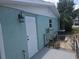 Exterior view of home with back entrance at 6731 Old Main St, New Port Richey, FL 34653