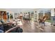 Bright and airy sunroom with tile flooring and lots of natural light at 700 Bowsprit Pl, Palm Harbor, FL 34685