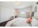 Bright bedroom with neutral color palate and large closet at 7115 Bay St, St Pete Beach, FL 33706