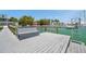 Waterfront dock with bench overlooking the marina at 7115 Bay St, St Pete Beach, FL 33706
