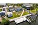 Inviting waterfront property featuring a private dock, charming firepit, and well-maintained backyard at 825 Seabreeze Dr, Ruskin, FL 33570