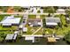 Waterfront home with a private dock, backyard firepit, and a useful storage shed at 825 Seabreeze Dr, Ruskin, FL 33570
