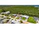 Inviting waterfront home featuring a private dock, lush surroundings, and tranquil canal access at 825 Seabreeze Dr, Ruskin, FL 33570