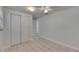Bedroom with tile flooring and closet with sliding doors at 825 Seabreeze Dr, Ruskin, FL 33570