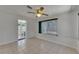 Dining room with tile flooring, lots of light, and neutral paint at 825 Seabreeze Dr, Ruskin, FL 33570