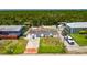 Charming single-story waterfront home with a private dock and lush landscaping at 825 Seabreeze Dr, Ruskin, FL 33570