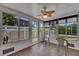 Bright sunroom with lots of windows and outdoor views at 825 Seabreeze Dr, Ruskin, FL 33570