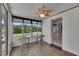 Screened sunroom with access to the backyard at 825 Seabreeze Dr, Ruskin, FL 33570
