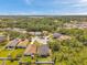 Aerial view of a neighborhood featuring green trees, single Gathering homes and cul-de-sacs at 8504 Tidal Bay Ln, Tampa, FL 33635