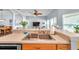 Close-up of kitchen sink with views into the living and dining areas at 8504 Tidal Bay Ln, Tampa, FL 33635