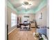Bright office with wood floors, large window, ceiling fan, and desk with office chair at 8504 Tidal Bay Ln, Tampa, FL 33635