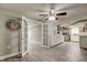 Stylish kitchen featuring white cabinetry, stainless steel appliances, modern tile flooring, and an open layout, ideal for cooking at 9120 Lunar Ln, Port Richey, FL 34668