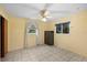 Tranquil bedroom with a safe and windows, offering a secure and bright retreat at 9615 Jasmine Blvd, New Port Richey, FL 34654