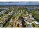 A waterfront property featuring a canal, boat lift, and proximity to a neighborhood with gulf access at 103 W North Branch Rd, Ruskin, FL 33570