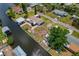 A waterfront home with mature trees, brick patio, private dock and boat lift at 103 W North Branch Rd, Ruskin, FL 33570