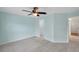 Light and bright bedroom with tile flooring and ceiling fan at 10431 Frog Pond Dr, Riverview, FL 33569