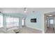 Comfortable living room with light walls, wood flooring and bright natural light at 10431 Frog Pond Dr, Riverview, FL 33569