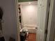 Standard bathroom with tiled shower and commode at 10539 Parkcrest Dr, Tampa, FL 33624
