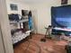 Simple bedroom with bunk beds, vinyl flooring, and natural light at 10539 Parkcrest Dr, Tampa, FL 33624