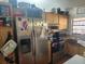 Functional kitchen with stainless steel refrigerator and appliances; ample cabinet storage at 10539 Parkcrest Dr, Tampa, FL 33624