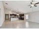 Bright and airy living room with an open kitchen concept at 10822 Crushed Grape Dr, Riverview, FL 33578